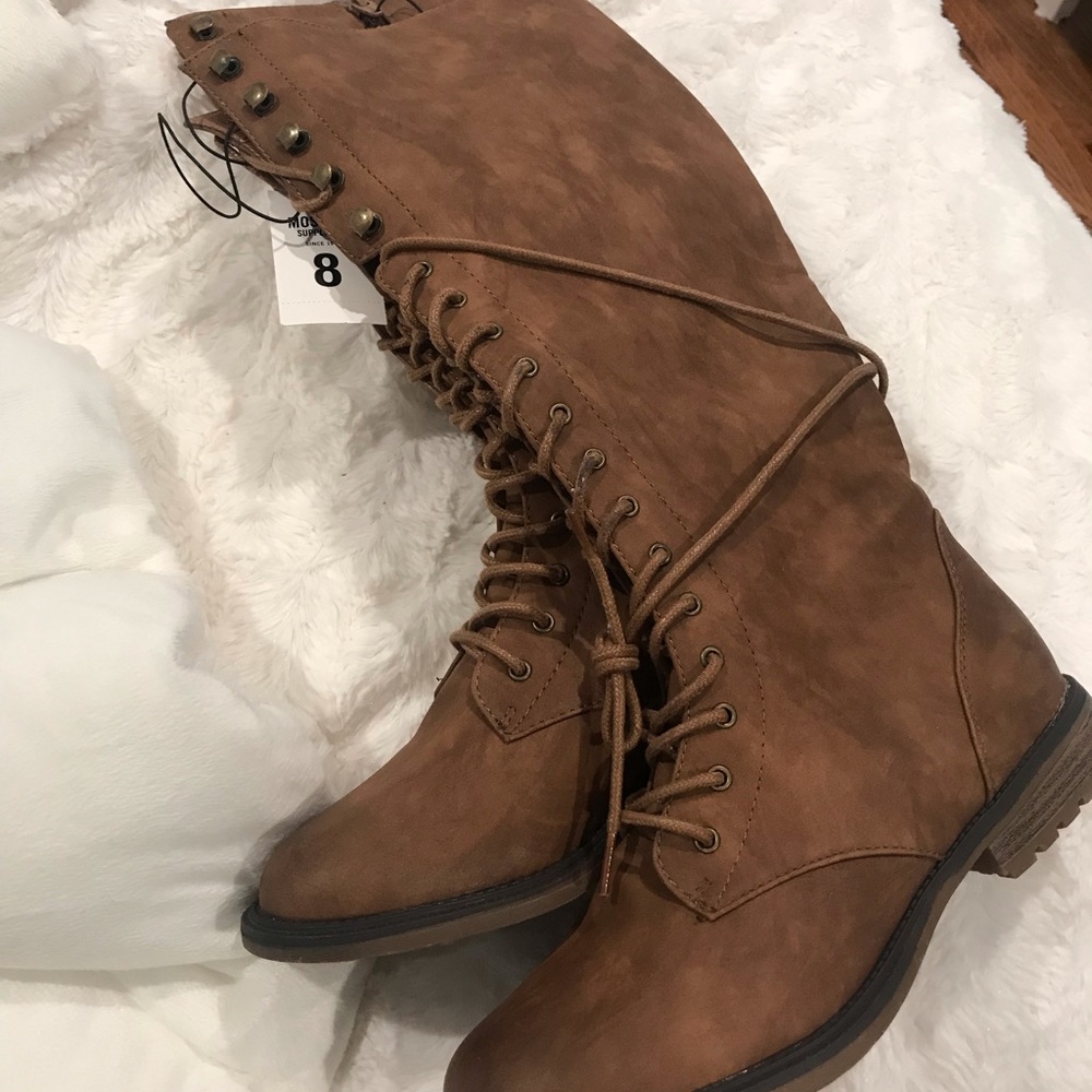 Brand new women’s tie up boots